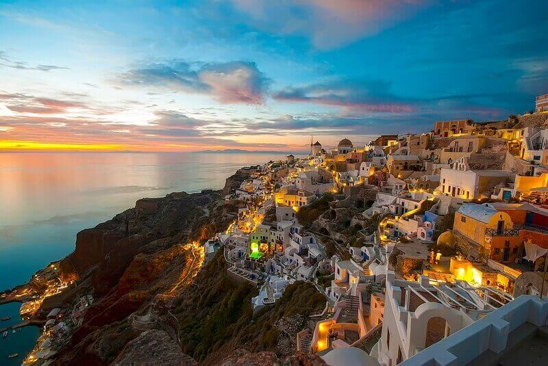 Romantic sunset colors in Oia village on the Greek island of Santorini